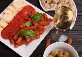 Salami, kabanos, cheese starters and wine