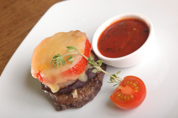 beef steak with tomato cheese