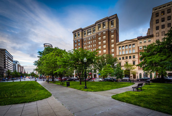 Fototapeta premium Walkways and buildings at McPherson Square, in Washington, DC.