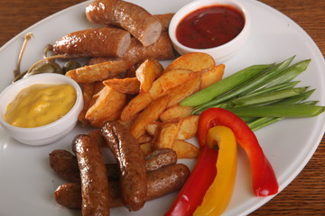 beer snack of sausages and mashed potatoes