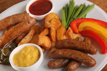 beer snack of sausages and mashed potatoes