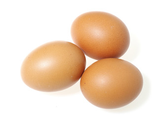 Fresh chicken eggs isolated on white background