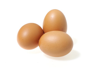 Fresh chicken eggs isolated on white background