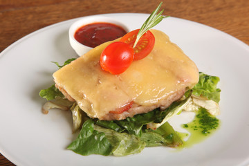 meat with cheese on lettuce