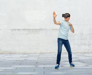 Fototapeta na wymiar man in virtual reality headset or 3d glasses