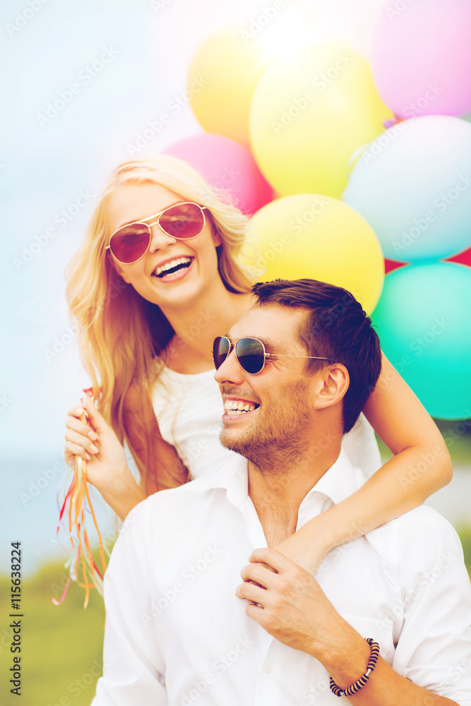 Canvas Prints couple with colorful balloons at seaside