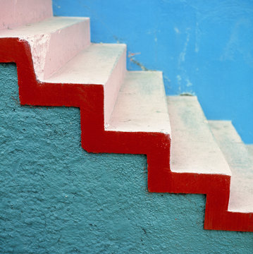 South America, Argentina, Buenos Aires. Stark, colorful and striking stairs are part of La Boca, Buenos Aires, Argentina.