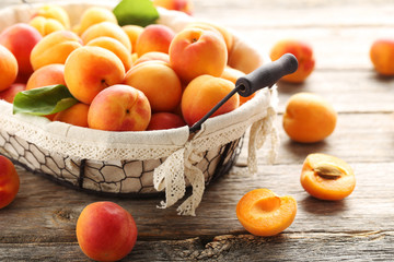 Ripe apricots fruit on grey wooden table
