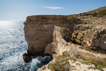 Small man Giant Cliffs - Migra l-Ferha, Malta, Europe