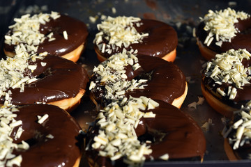 Donuts with chocolate glaze and almond
