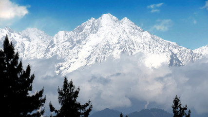 View of snow capped Himalayan mountain range, Shimla, Himachal Pradesh, India.