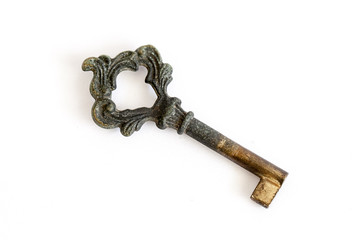 Old key on white background