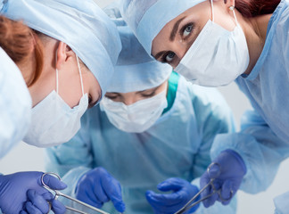 Medical team performing operation