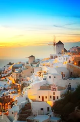 Poster lights of Oia village at evening, Santorini island, Greece, toned © neirfy