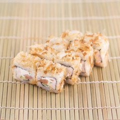 Isolated sushi / rolls.