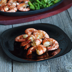 Dish with fried shrimp and green beans