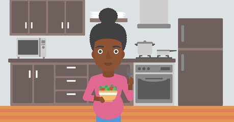 Pregnant woman with vegetables and fruits.