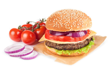 Homemade cheeseburger isolated on white background
