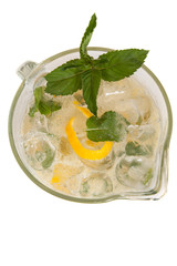 Lemonade in the jug, top view. Isolated on white