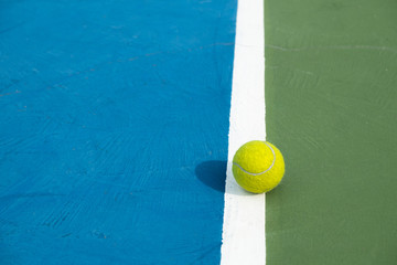 tennis ball on the court - close up with text space