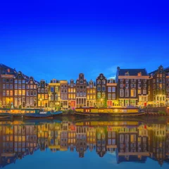 Fotobehang Amstel river, canals and night view of beautiful Amsterdam city. Netherlands © boule1301