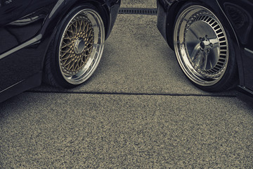 background of tuning car wheels on street