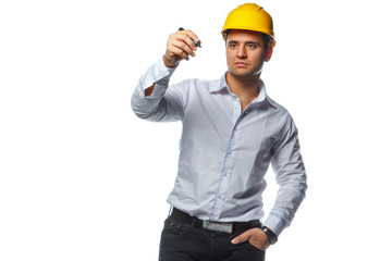 Male in yellow safety helmet holding a pen.