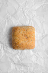 Fresh white bread on a parchment