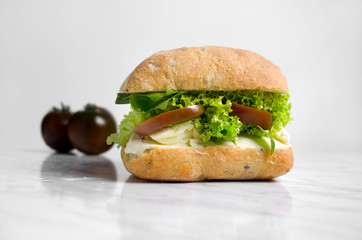 Healthy sandwich with tomatoes and cream cheese