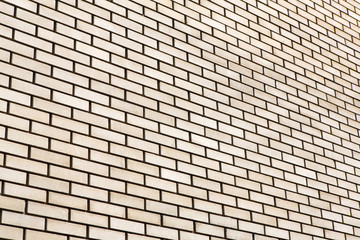 Beige brick wall background