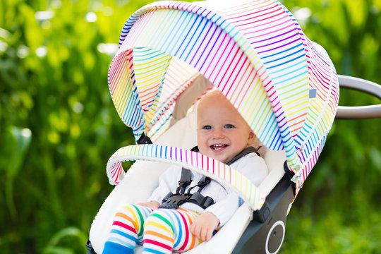 Baby in white stroller