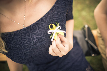 Myrtle flower on dress on wedding