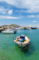 Traditional colorful Greek fishing boat in Naoussa port, Paros island, Greece. Cyclades.