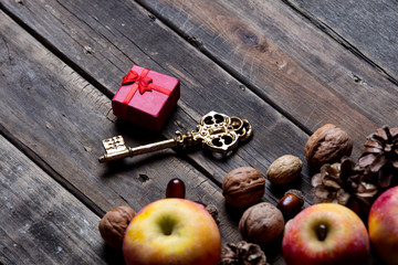 apples, fir-cones, gift, key and nuts