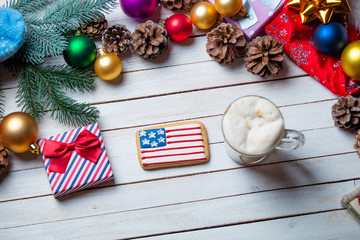 christmas decorations, gift and cup of coffee