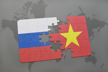 puzzle with the national flag of russia and vietnam on a world map background.