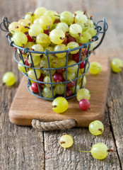 gooseberries on wooden surface