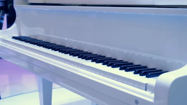 Keyboard of the brilliant white piano