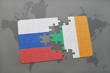 puzzle with the national flag of russia and ireland on a world map background.