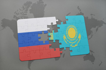 puzzle with the national flag of russia and kazakhstan on a world map background.