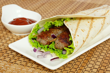 Grilled sausage meat in pita bread. Kebab