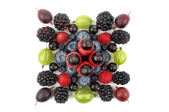 different berries in the form of a square on a white background