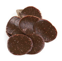 Chocolate chips on white background