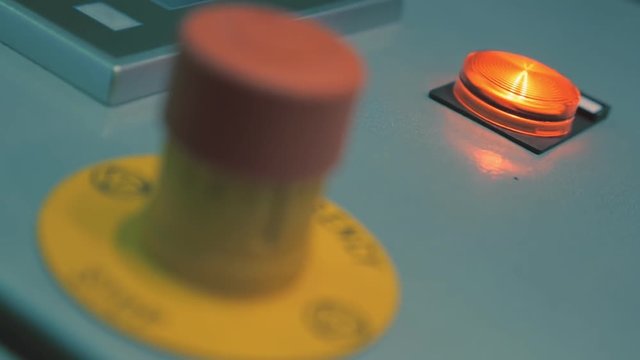 Equipment switching panel with a flashing warning lamp 