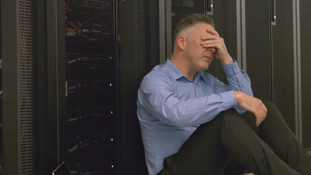 Technician feeling the pressure in server room