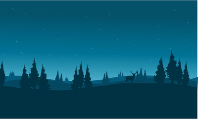 silhouette of snowing winter town