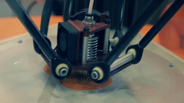 3D printer prints from orange