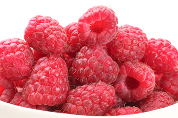 Raspberries close-up on white