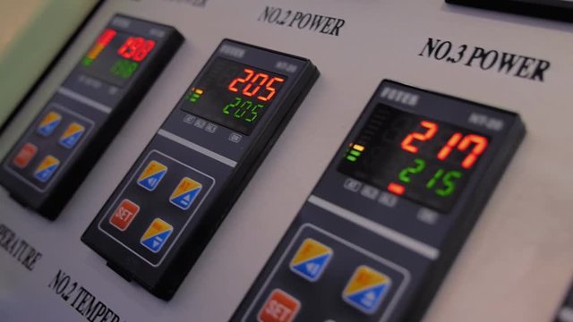The main control panel with ampere meters and digital displays of the temperatur