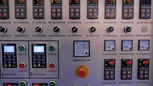 The main control panel with buttons, voltmeter and digital displays